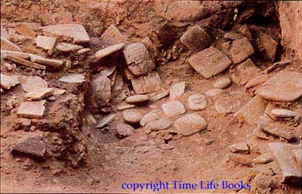 Ebla_Tablets.jpg - Clay tablets in Ebla's archives lie where they fell when their shelving collapsed in a fire some 40 centuries ago, Syria