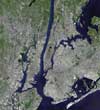 This 30-meter, low-resolution color satellite image of Manhattan and the New York City area was collected in the summer of 1997 by the Landsat 5 satellite. The satellite was operated by Space Imaging of Denver, Colo.