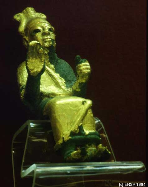 Ugarit_ugarit20.jpg - Statuette of the chief God El, at Ugaritic pantheon. El. Seated on a throne and raising his hand in benediction, Ugarit, Latakia,  Syria